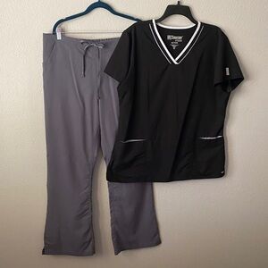 Grey's Anatomy Black and Gray scrub top and Carhartt scrub pants.